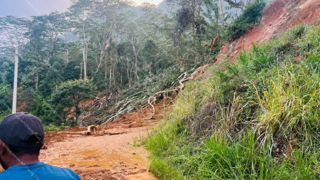 Wide view of cyclone and landslide damage in Pathahewaheta