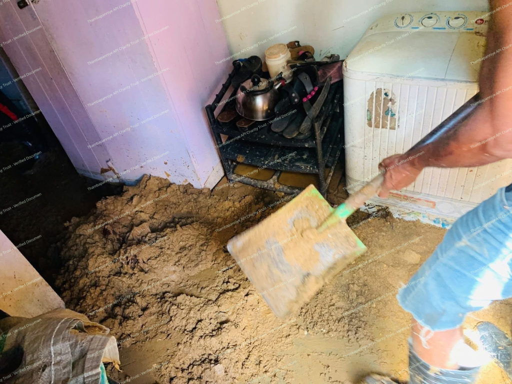 Interior home damage and debris after wall failure