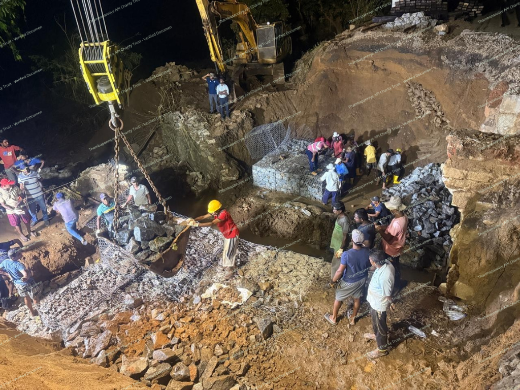 Nighttime heavy machinery operation at a collapsed site